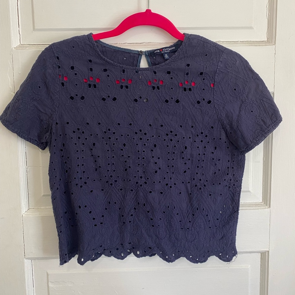 Small, navy, cropped top with lace holes
